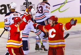 Calgary Flames Andrew Mangiapane scores on Edmonton Oilers goalie Mike Smith in first period action during Round two of the Western Conference finals at the Scotiabank Saddledome in Calgary on Wednesday, May 18, 2022. 