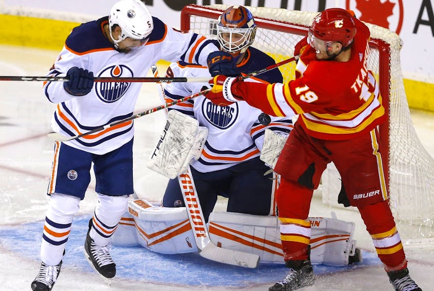  Calgary Flames forward Matthew Tkachuk battles Edmonton Oilers goalie Mikko Koskinen during Round 2 of the Western Conference finals at the Scotiabank Saddledome in Calgary on Wednesday, May 18, 2022.