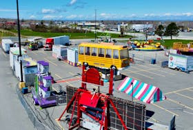 The parking lot at Sydney's Mayflower Mall is under transformation as workers with Hinchey’s Rides and Amusements prepare the site for its scheduled Friday opening. The traditional and popular traveling carnival will be in town until June 18. DAVID JALA/CAPE BRETON POST