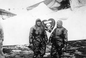 Charles Nungesser, left, and François Coli are pictured with their plane, which featured Nungesser’s First World War flying ace logo. - Courtesy Ian Sumner