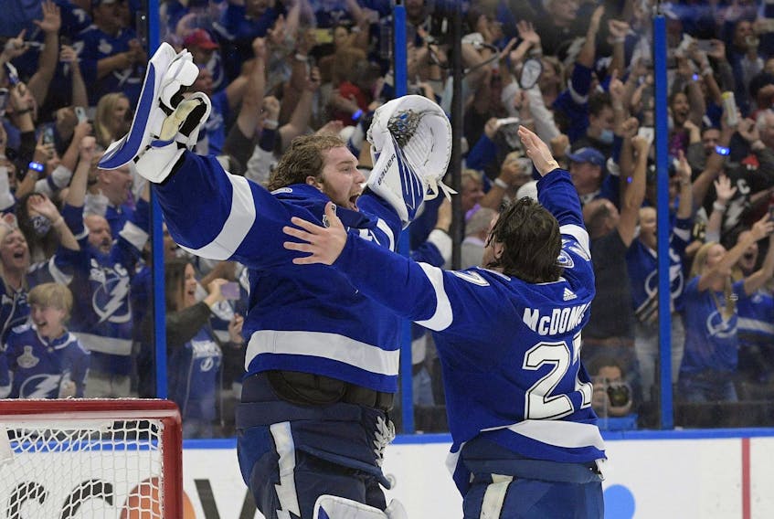 Tampa Bay Lightning defenceman Ryan McDonagh and goaltender Andrei Vasilevskiy celebrate the team's Stanley Cup finals series in Game 5 of the Stanley Cup last summer. 