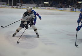 Charlottetown Islanders defenceman and assistant captain Noah Laaouan, 6, carries the puck into the offensive zone during a Quebec Major Junior Hockey League regular-season game against the Moncton Wildcats at Eastlink Centre.