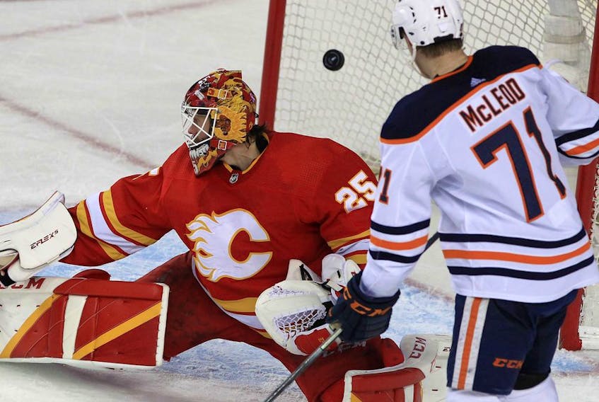 A shot from Edmonton Oilers defencemen Evan Bouchard beats Calgary Flames goalie Jacob Markstrom in Game 2 of their second-round playoff series at Scotiabank Saddledome on Friday, May 20, 2022. 