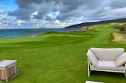  As spectacular as each of the 18s are, this green side 19th hole to end your day at Cabot Cliffs is a relaxing way to chill after your round. Rob Longley/Toronto Sun
