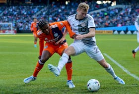 Toronto FC forward Jacob Shaffelburg of Port Williams (right) and New York City FC defender Tayvon Gray fight for the ball during a Major League Soccer on April 24 at Citi Field in New York. - BRAD PENNER / USA Today Sports
