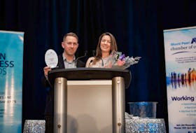 Golf Shotz co-owners Trever Hefferan and Tara O'Reilly hold their innovation award at the Best in Business Gala. - Contributed by Tara O'Reilly