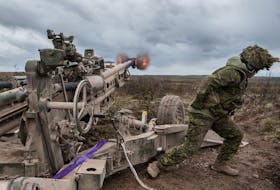 Soldiers from the Royal Canadian Artillery School fire an M777 howitzer during training in 2018.