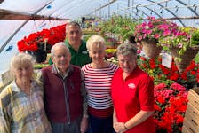 Antigonish County's Duykers Greenhouses are celebrating fifty years in operation. Pictured are Beverly Fraser (staff), John Duykers, Johnny Duykers, WIllie Duykers and Thelma Rovers (staff).
