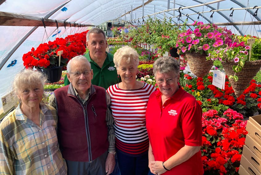 Antigonish County's Duykers Greenhouses are celebrating fifty years in operation. Pictured are Beverly Fraser (staff), John Duykers, Johnny Duykers, WIllie Duykers and Thelma Rovers (staff).
