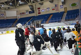 Charlottetown Islanders general manager and head coach Jim Hulton explains a drill during a practice at Eastlink Centre on May 22 in preparation for the Quebec Major Junior Hockey League semifinals. The Islanders and Sherbrooke Phoenix meet in Game 1 of the best-of-five series in Charlottetown on May 25 at 7 p.m. Jason Simmonds • The Guardian