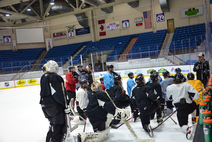 Charlottetown Islanders general manager and head coach Jim Hulton explains a drill during a practice at Eastlink Centre on May 22 in preparation for the Quebec Major Junior Hockey League semifinals. The Islanders and Sherbrooke Phoenix meet in Game 1 of the best-of-five series in Charlottetown on May 25 at 7 p.m. Jason Simmonds • The Guardian