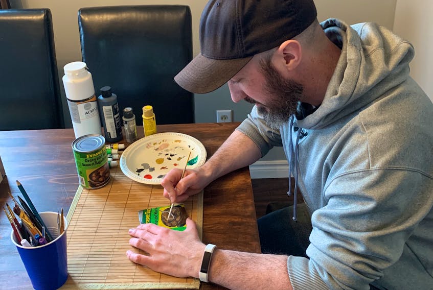 Bill Short got into painting rocks almost three years ago. Today the Corner Brook man enjoys painting food items, like a can of Fraser Farm Gravy and Meatballs. - Contributed