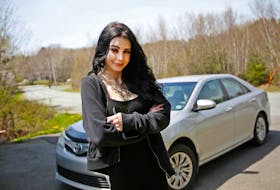 FOR TAPLIN STORY:
Madison Hamilton is seen with her car near her Fall River home Friday May 13, 2022. She struck a pothole on an exit ramp off Highway 102, en route to Lower Sackville, that she says was so large that it dislodged a kidney stone that caused her great distress and necessitated surgery...and then caught covid19 in hospital.

TIM KROCHAK PHOTO