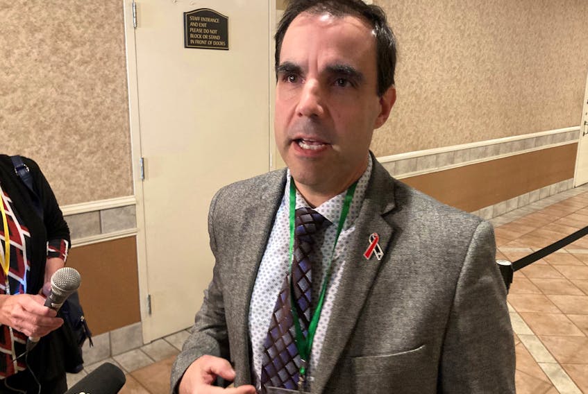 Josh Bryson, the lawyer representing the family of Portapique victims Peter and Joy Bond, talks to reporters Wednesday, May 25, 2022, about the Mass Casualty Commission's decision on witness accommodations. - Francis Campbell