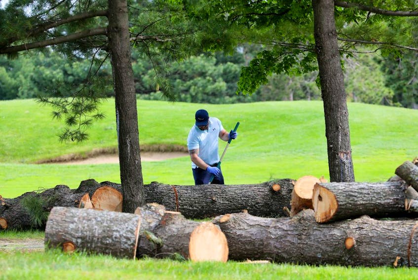  Crews are seen cleaning up the Ottawa Hunt and Golf Club on Wednesday, May 25, 2022.