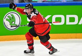 Canada's forward Drake Batherson celebrates scoring the 3-4 goal during the IIHF Ice Hockey World Championships quarterfinal match between Sweden and Canada in Tampere, Finland, on May 26, 2022. 