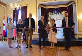 County of Kings Deputy Mayor Emily Lutz; Town of Kentville Deputy Mayor Cate Savage, Kings North MLA John Lohr, Kings-Hants MP Kody Blois, Queen Annapolisa the 87th Chantal Peng and Apple Blossom Festival president Logan Morse prepare to cut the ribbon officially opening the 88th Annapolis Valley Apple Blossom Festival. KIRK STARRATT
