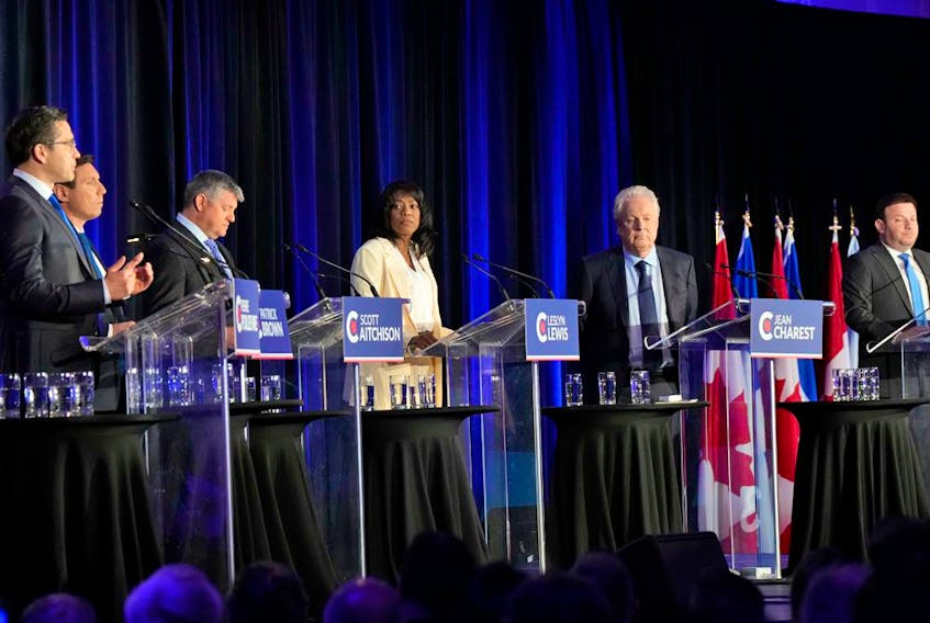  Conservative leadership candidates, from left, Pierre Poilievre, Patrick Brown, Scott Aitchison, Leslyn Lewis, Jean Charest and Roman Baber take part in the Conservative Party of Canada French-language leadership debate in Laval, Quebec on May 25, 2022.