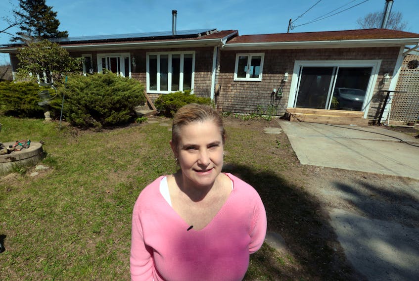 May 12, 2022--For Terrilee Bulger in Ingramport, Nova Scotia, getting involved with Solar City was an easy extention for her mindfulness of the environment. Last year she had solar panels installed on both sides of her roof.
ERIC WYNNE/Chronicle Herald