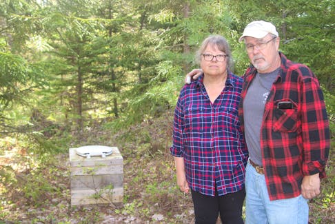 Ann and Jim Veinot aren’t impressed people created makeshift toilets near the public beach at Trout Lake.