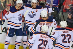 The Edmonton Oilers celebrate scoring on the Calgary Flames during their Stanley Cup playoff series in Calgary on Thursday, May 26, 2022.