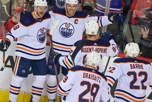 The Edmonton Oilers celebrate scoring on the Calgary Flames during their Stanley Cup playoff series in Calgary on Thursday, May 26, 2022.