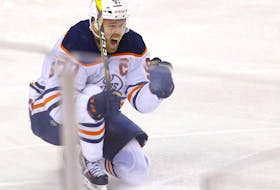 Edmonton Oilers Connor McDavid scores on Calgary Flames goalie Jacob Markstrom in overtime action to beat the Flames 5-4 and take Round two of the Western Conference finals at the Scotiabank Saddledome in Calgary on Thursday, May 26, 2022. 