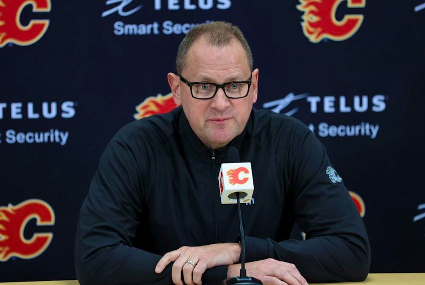 Calgary Flames general manager Brad Treliving talks with media at the Scotiabank Saddledome in Calgary on Saturday, May 28, 2022. 
