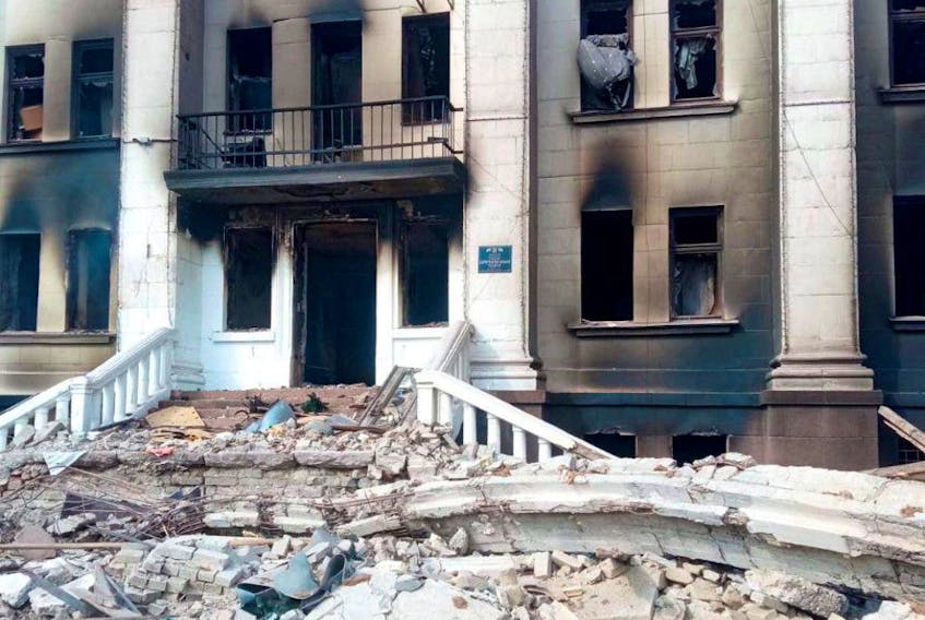  General view of the remains of the drama theatre, which was hit by a bomb when hundreds of people were sheltering inside in Mariupol, Ukraine, in this handout picture released March 18, 2022.