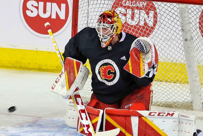  Flames goaltender Jacob Markstrom practises at the Scotiabank Saddledome on Monday.