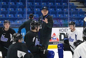 Gardiner MacDougall explains a drill during a recent practice. MacDougall, who grew up in Bedeque, P.E.I., was recently named Sea Dogs head coach for the Memorial Cup in Saint John, N.B., from June 20 to 29. MacDougall will return to his position as head coach of the UNB Reds’ men’s hockey program following the Canadian major junior hockey championship tournament, which will also feature the champions of the Quebec Major Junior Hockey League, Ontario Hockey League and Western Hockey League. Michael Hawkins/Saint John Sea Dogs