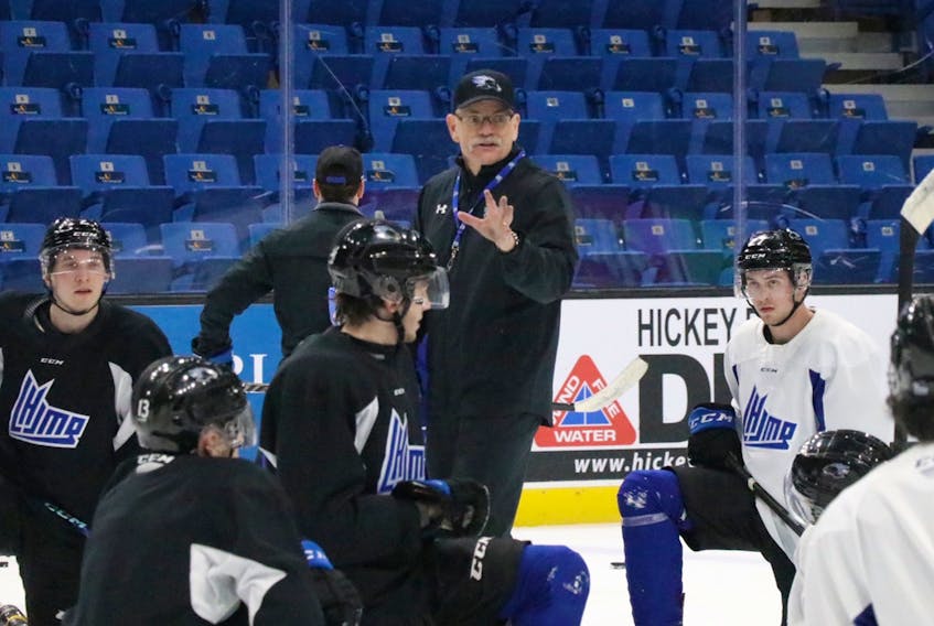 Gardiner MacDougall explains a drill during a recent practice. MacDougall, who grew up in Bedeque, P.E.I., was recently named Sea Dogs head coach for the Memorial Cup in Saint John, N.B., from June 20 to 29. MacDougall will return to his position as head coach of the UNB Reds’ men’s hockey program following the Canadian major junior hockey championship tournament, which will also feature the champions of the Quebec Major Junior Hockey League, Ontario Hockey League and Western Hockey League. Michael Hawkins/Saint John Sea Dogs