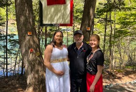 Kalolin Johnson, from left, Myles Goodwyn, and DeeDee Austin were on Goat Island in Eskasoni on Thursday. Goodwyn, a Canadian music icon with rock band April Wine, partnered with the Eskasoni community to advocate for missing and murdered Indigenous women and girls in the form of a music video. Johnson and Austin were key performers in the video. CONTRIBUTED