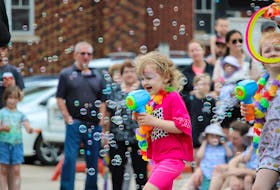 Ava Stoddard was having fun making bubbles during the Apple Blossom Festival children’s parade May 28 in Kentville. Ava is the niece of Jessica Stoddard, an early childhood educator with Wolfville Children’s Centre, and was part of the centre’s entry into the parade.
