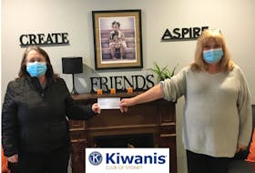 Helping Big Brothers Big Sisters Kiwanis Club of Sydney Treasurer Cathy Sutherland stopped in to visit Francine Hall at Big Brothers Big Sisters Cape Breton to present a $1,000 donation to help provide children with high quality, volunteer based mentoring programs.