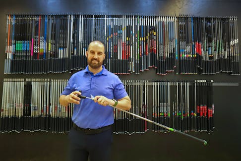 FOR  BILL SPURR STORY:
 Ryan O'Connell is seen n front of the shaft fitting wall at the new golf store at MicMac Mall in Dartmouth Tuesday May 3, 2022.

TIM KROCHAK PHOTO