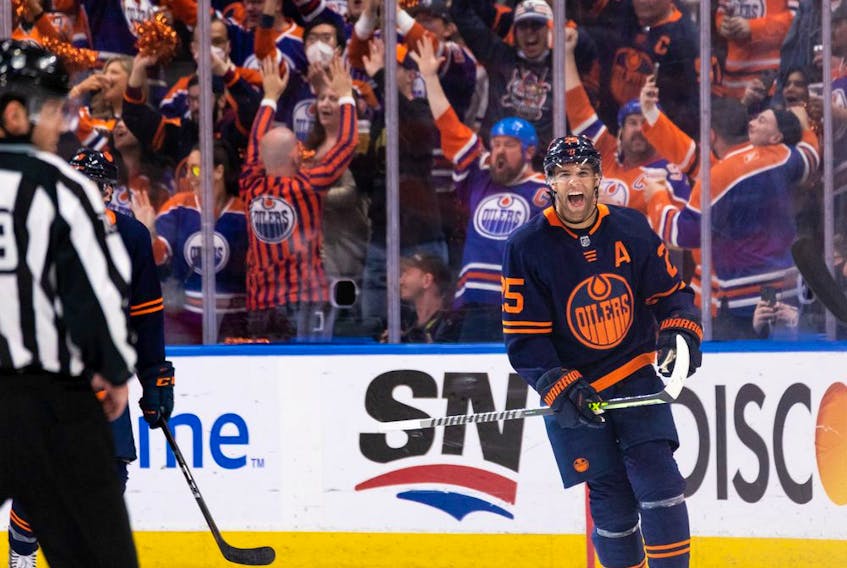  Edmonton Oilers’ Darnell Nurse (25) celebrates a goal with teammates on L.A. Kings’ goaltender Jonathan Quick (32) during second period NHL action in Game 2 of their first round Stanley Cup playoff series in Edmonton, on Wednesday, May 4, 2022.