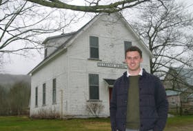 Avery Jackson is the president of the Clarence Community Club. The 1 ½-storey wooden structure, a Greek Revival style building, housed the community’s school until 1968. It has received municipal heritage designation.