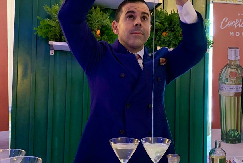  Master mixologist Ago Perrone demonstrating the fine art of making the perfect martini – stirred, not shaken.