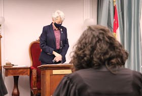 Hon. Antoinette Perry, Lieutenant Governor of P.E.I., stands in the house to give royal assent to the spring sitting’s bills. - Logan MacLean • The Guardian