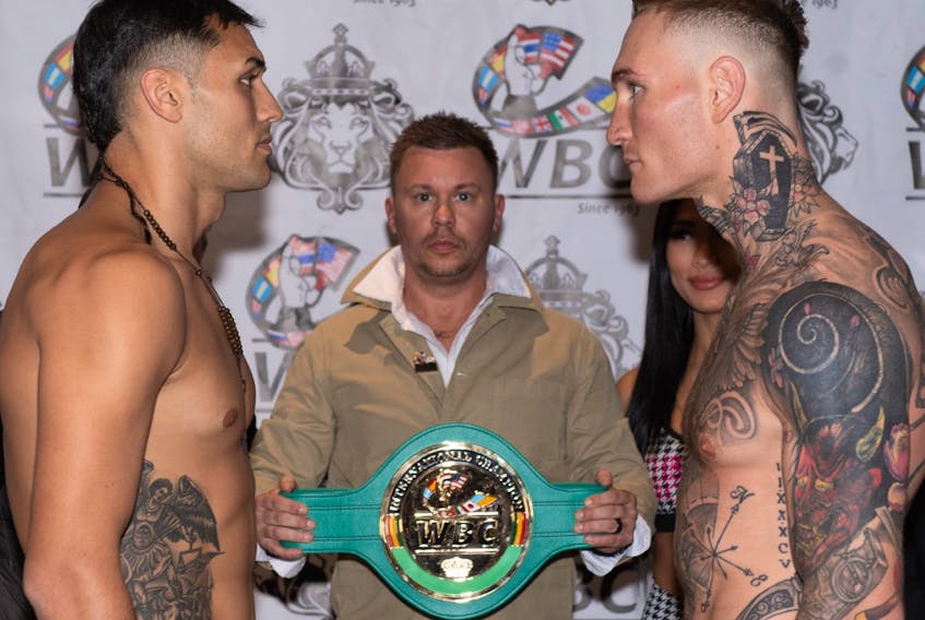 Yamil Peralta, left, and Ryan Rozicki of Sydney Forks will clash for the World Boxing Council's International Cruiserweight Championship. Both fighters made their weight and are shown during the card's official weigh-ins at Boston Pizza in Sydney on Friday. PHOTO CONTRIBUTED/JEFF LOCKHART.