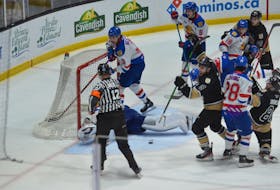 Charlottetown Islanders forward Zac Roy, 8, celebrates scoring a third-period goal off a rebound from linemate Xavier Simoneau, 81, on May 6. Roy’s goal gave the Islanders a 3-2 lead over the Moncton Wildcats. Charlottetown would go on to win the game 4-2 for a 2-0 lead in the best-of-five Quebec Major Junior Hockey League playoff series.