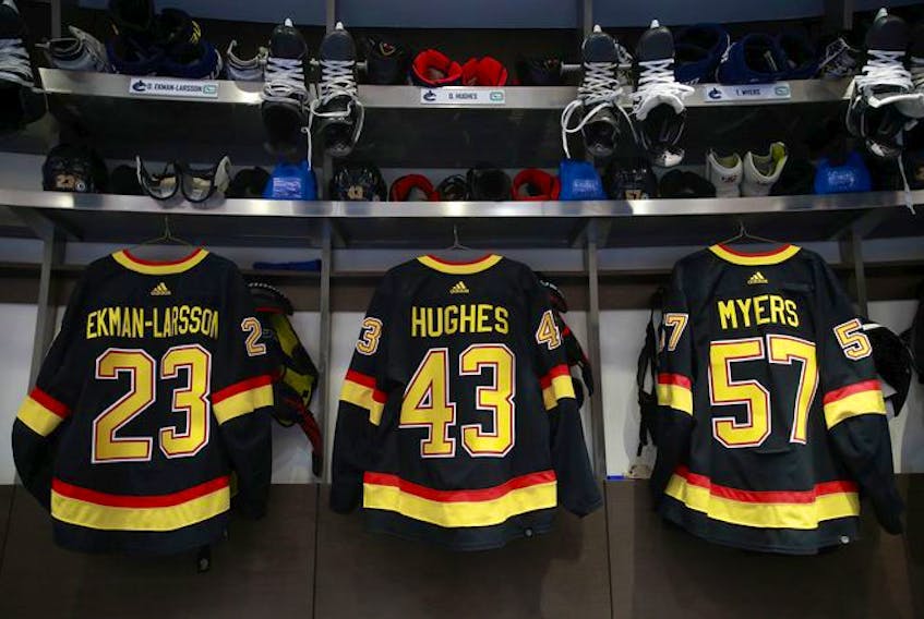  The Vancouver Canucks black skate jerseys hang in the dressing room before the NHL game against the Los Angeles Kings at Rogers Arena April 28, 2022.
