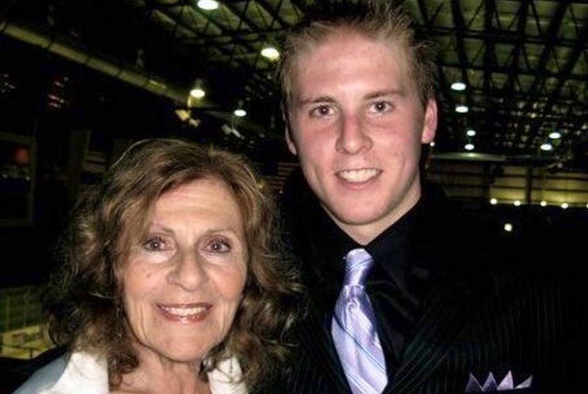  Blake Coleman, then skating in the United States Hockey League, with his late grandmother Marie Hoffman. As a kid, Coleman attended countless Dallas Stars games with Marie. (Courtesy of Coleman family)