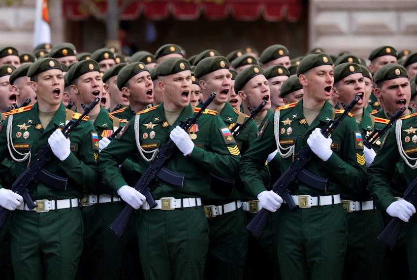 Russian service members take part in a military parade on Victory Day, which marks the 77th anniversary of the victory over Nazi Germany in the Second World War, in Red Square in central Moscow on May 9, 2022.