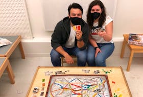 Logan and Samantha Mills of Stratford, P.E.I., are part-time employees of the popular Charlottetown toy and hobby store Owl’s Hollow. The husband-and-wife team have a keen understanding of popular games, as well as what makes a good game that one can come back to again and again.  They’re seen here playing Ticket to Ride, a popular game in which players compete to collect trains and build railroad routes across North America. David MacDonald photo