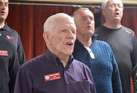 Cape Breton Chordsmen charter member Gerald Farrell, left, and the group’s newest member Stewart Read sing during a practice at the United Heritage Church in Sydney on May 2. The celebrated barbershop chorus is marking its 50th anniversary with a special gospel concert on May 15. Chris Connors/Cape Breton Post