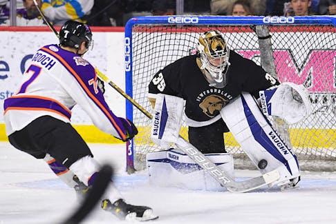 Newfoundland Growlers goaltender Keith Petruzelli makes a stop on Reading Royals’ forward Trevor Gooch during Game 2 of the team’s ECHL North Division final series on May 8. The Growlers won the game 4-1 and will welcome the Royals back to the Mary Brown’s Centre for the Games 3,4 and 5 of the series this week. Photo courtesy Newfoundland Growlers