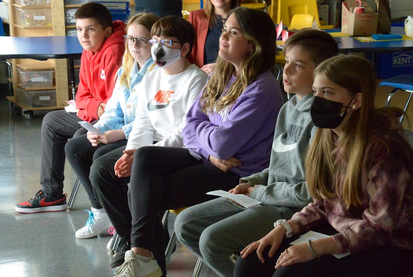 A group of grade 6 students at Elizabeth Park Elementary look on during the launch an original song and video project, Just Be You!. The student-centered and student-directed project project allowed students to develop and write an original song and then help in the creation of a professional music video.

Keith Gosse/The Telegram