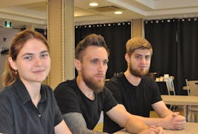 Three Ukrainian refugees have found work at the Holiday Inn Express in Deer Lake as they start their new life in Canada. From left, are Maryna Shchehlova, Max Krokhmalov and Alex Shalakhman. - Diane Crocker/SaltWire Network